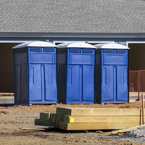 how often are the porta potties cleaned and serviced during a rental period in Christy